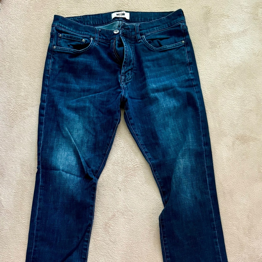 Men’s slightly distressed blue jeans
